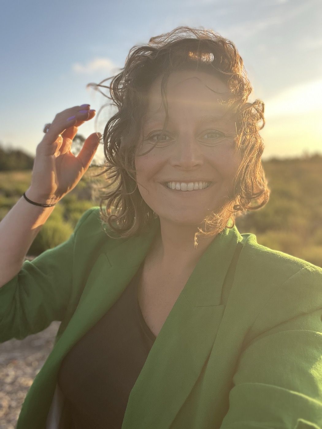 Sophie Behrendt, founder of Bespoke Aljezur, at golden hour on the Costa Vicentina